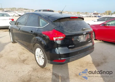 2016 Ford Focus Titanium z USA, uszkodzony, nr VIN 1FADP3N27GL374838